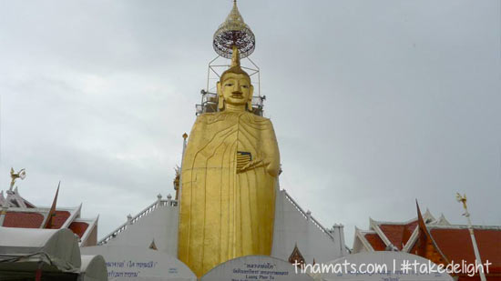 The standing Buddha.